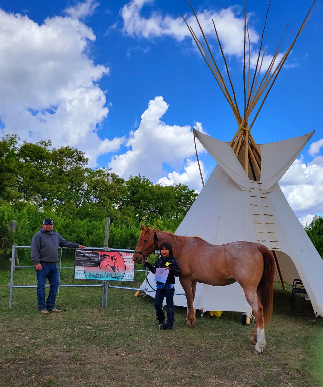 A horse and tipi at Spiritstone Ranch.